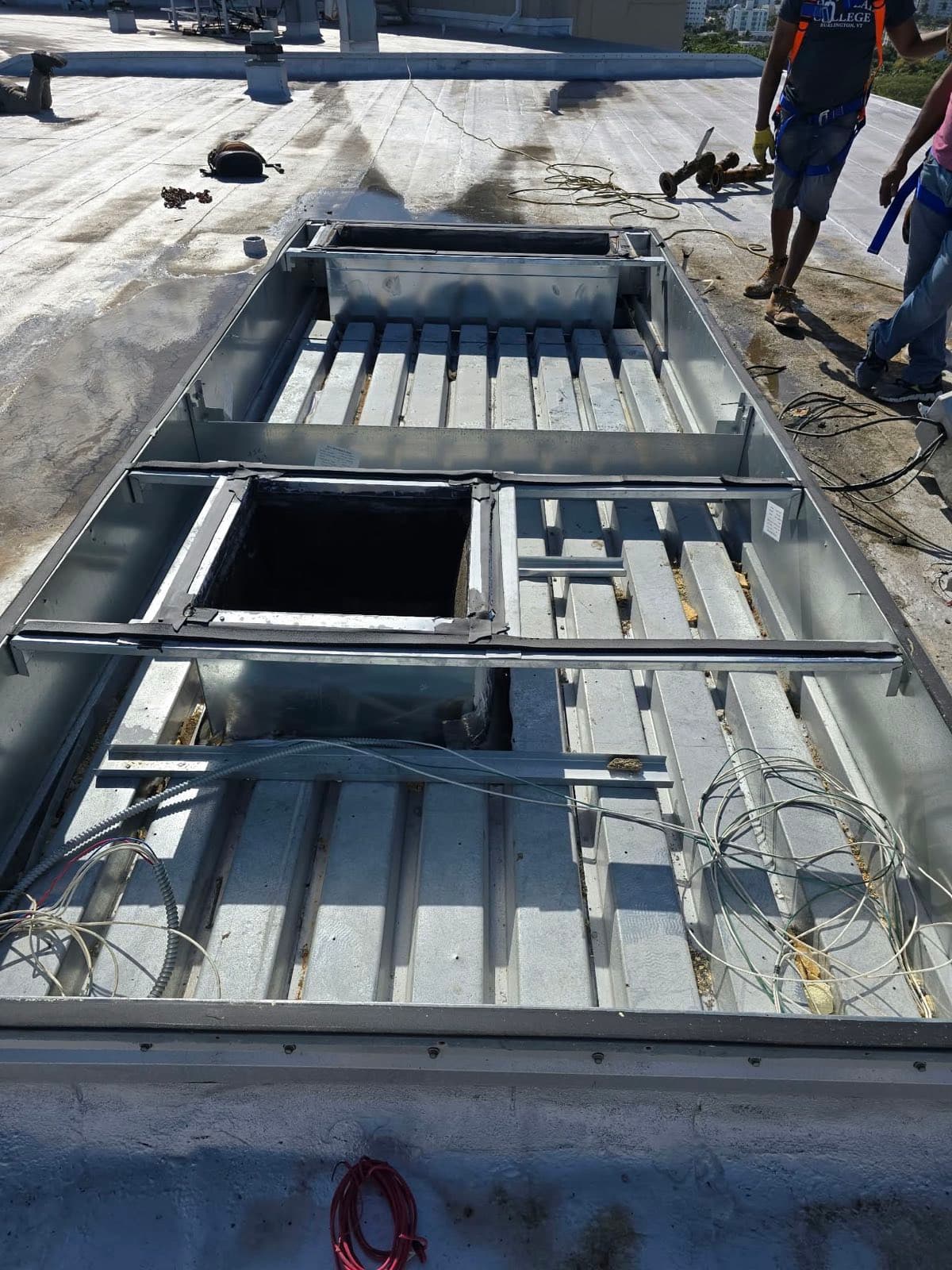 Curb prep — duct openings exposed after removal