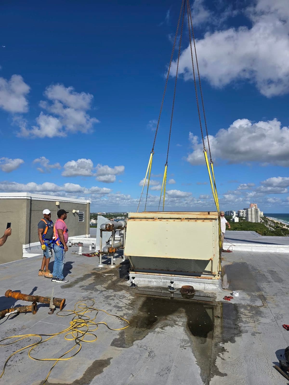 Rigging — slings and chains set on the old unit